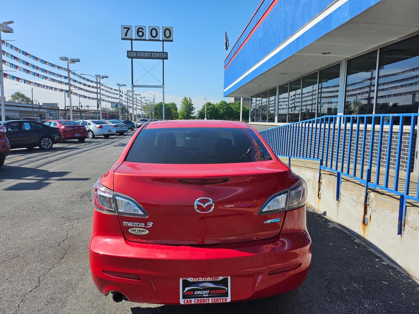 2013 RED Mazda MAZDA3 i Touring AT 4-Door (JM1BL1VP7D1) with an 2.0L L4 DOHC 16V engine, 5-Speed Automatic transmission, located at 7600 S Western Ave., Chicago, IL, 60620, (773) 918-3980, 0.000000, 0.000000 - Photo#3